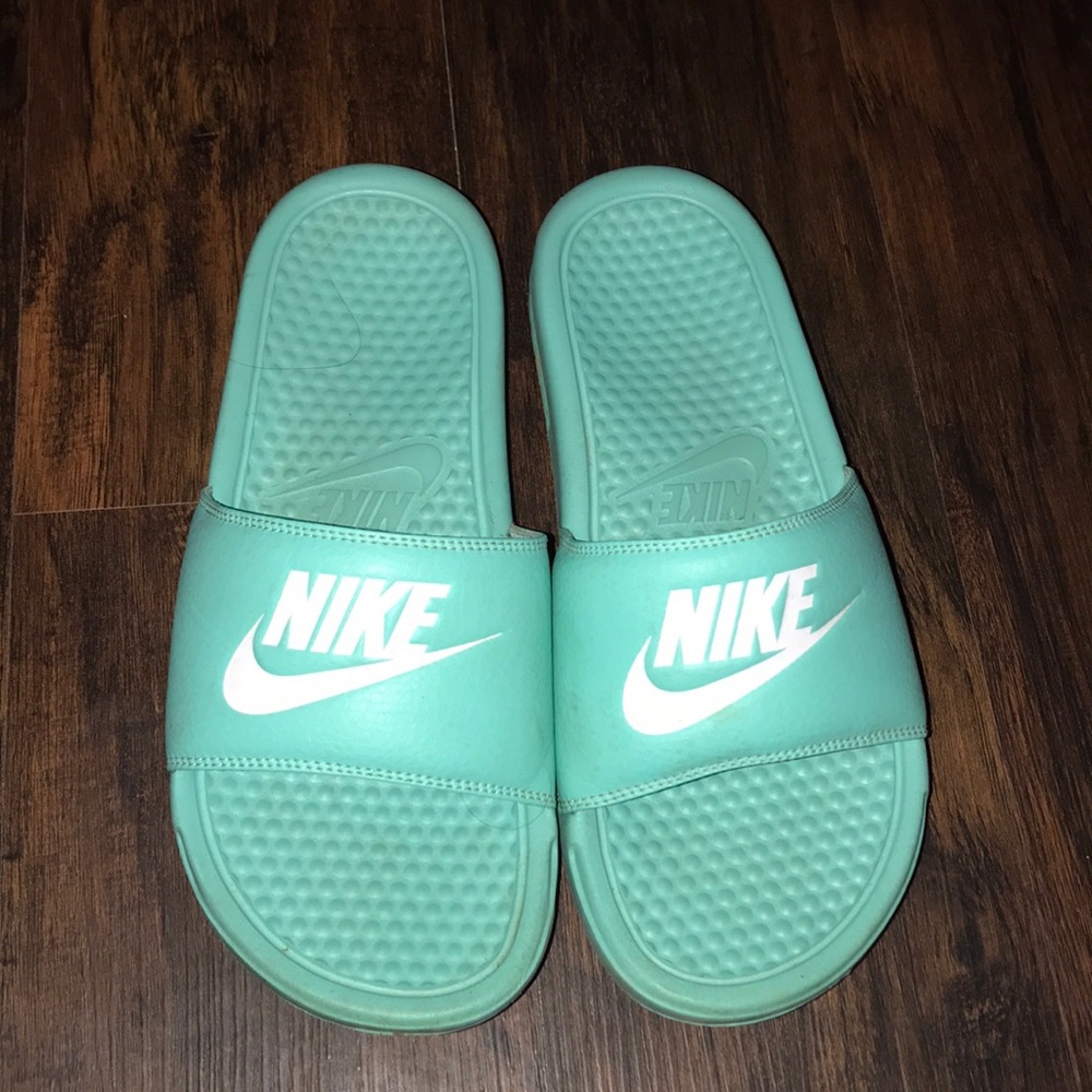 Blue nike slides